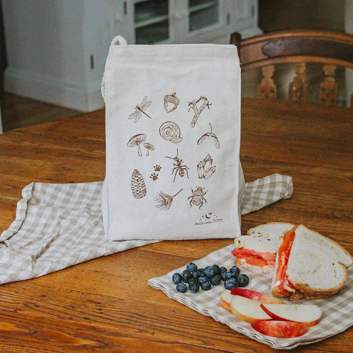 Bella Luna Custom Eco Lunch Bag on a table with sandwich and fruit