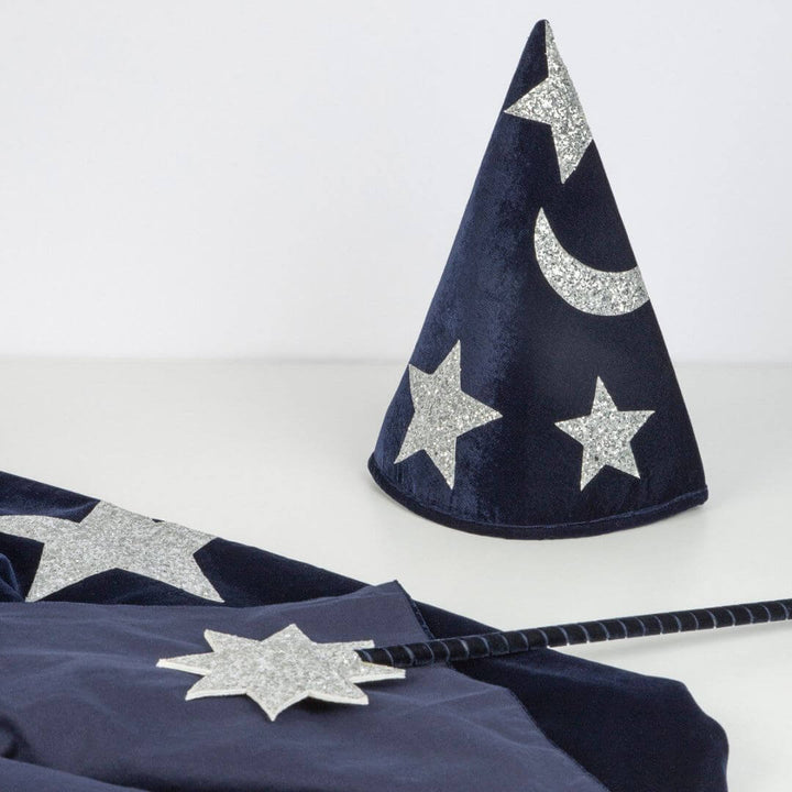 Pointy blue velve wizard hat with sparkly silver moon and star details.