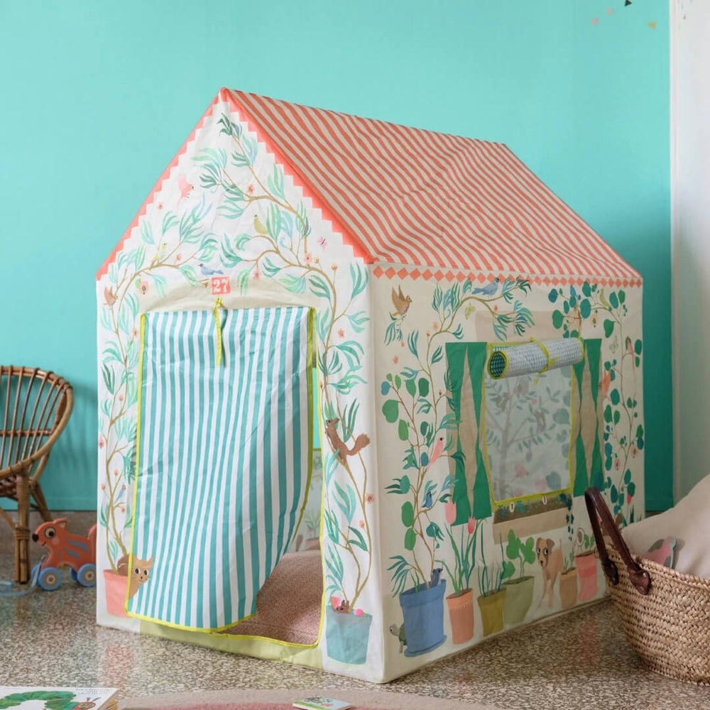 Djeco's Garden House Play Tent set up in a play room.