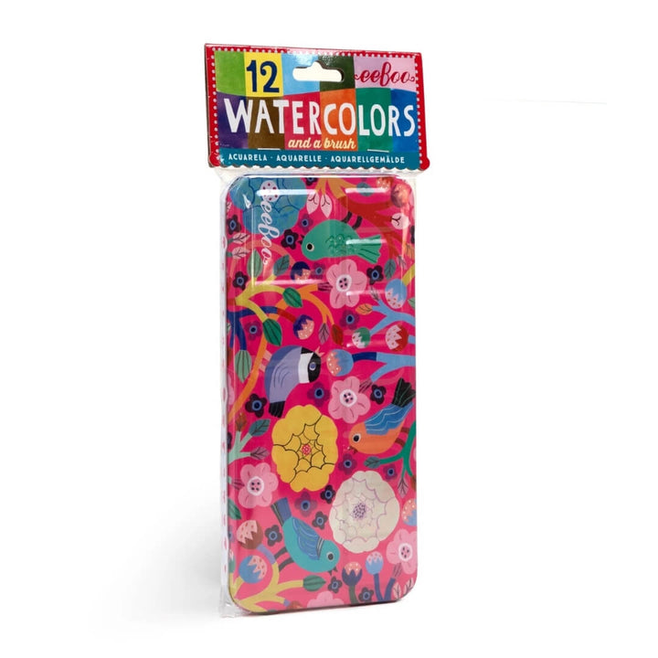 Watercolor paint set in a bright pink tin featuring birds and flowers artwork.