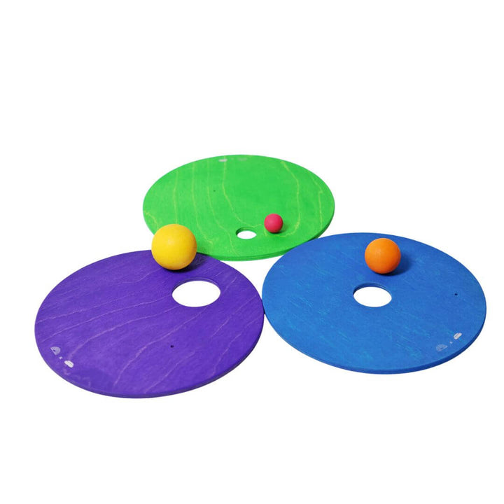 3 cool colored discs with 3 wooden balls from Grimm's Wooden Toys.