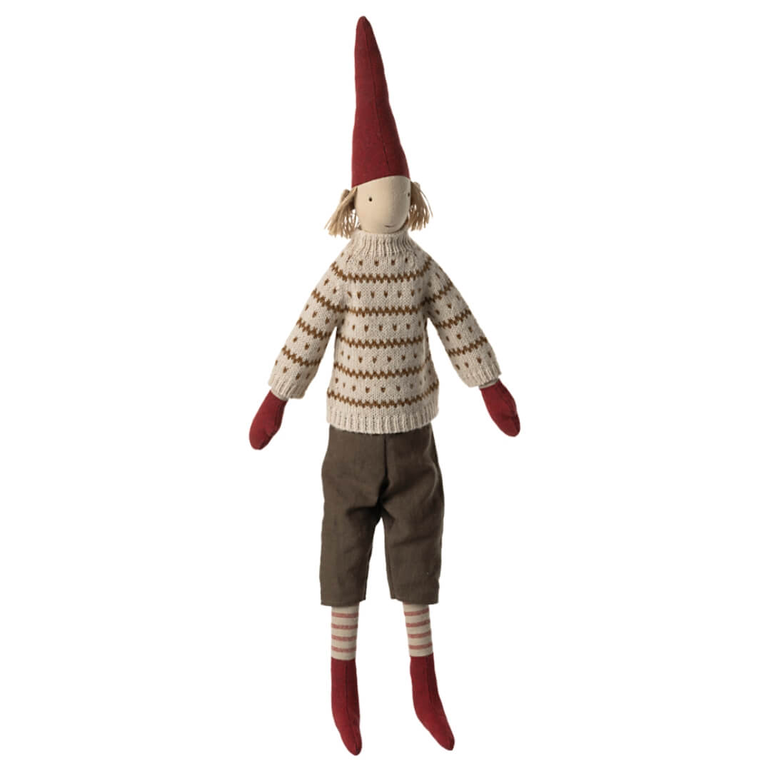 Pixy Boy wearing brown shorts, red mittens and stockings, and red pointed hat with blonde hair and cream knit sweater with gold stripes and polka dots. 