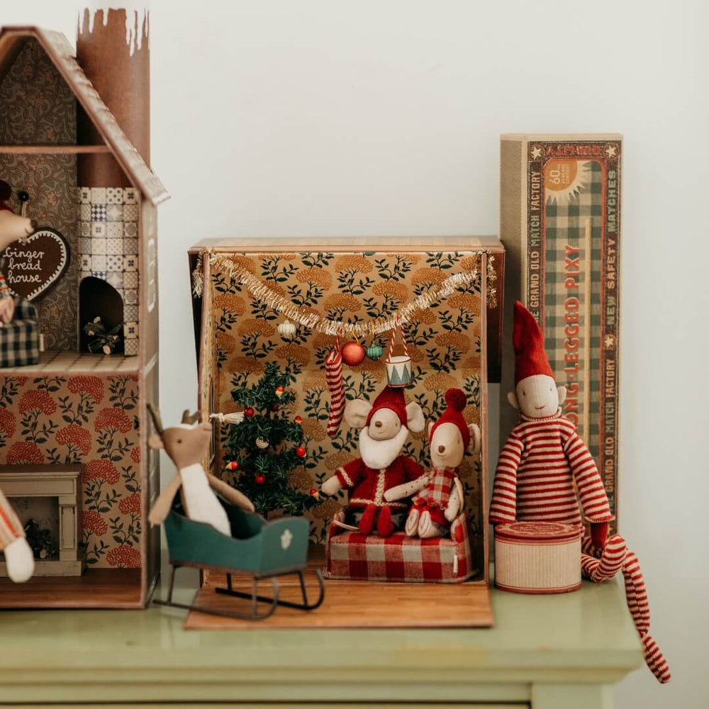 Maileg Santa Mouse with other elements from the Maileg holiday collection.