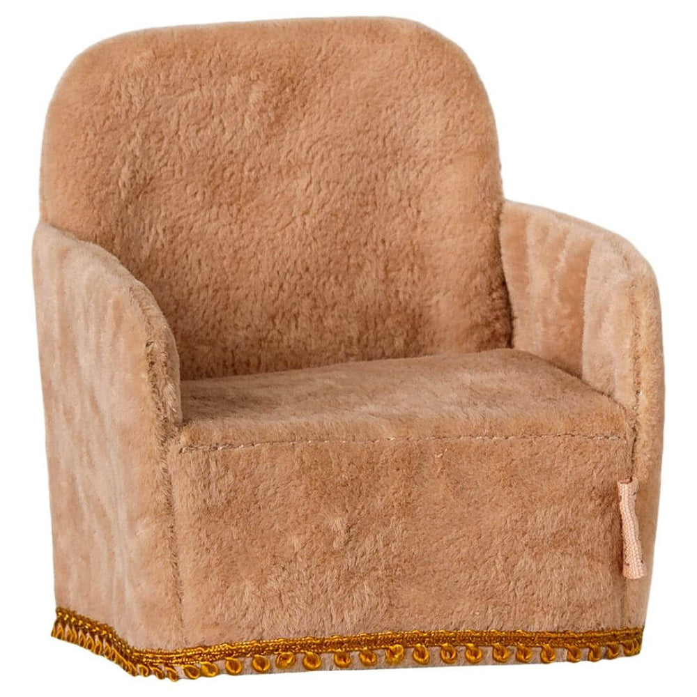 Maileg folding mouse sized arm chair in powder with gold accent on bottom.