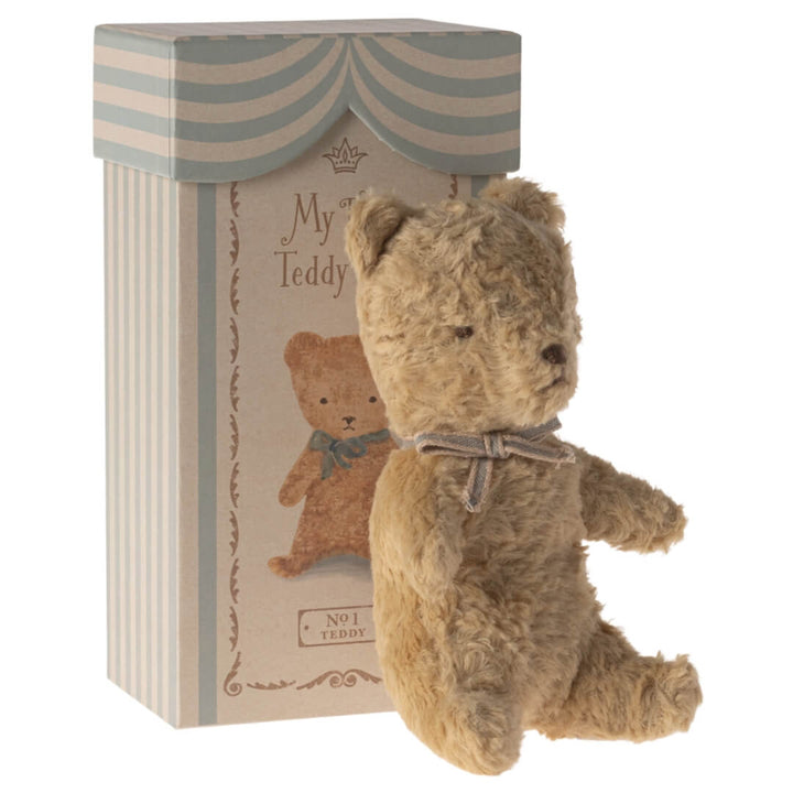 Maileg My First Teddy with a blue ribbon and box.