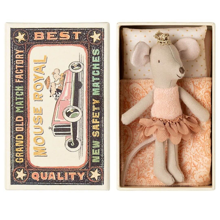 A Maileg princess mouse in pink ballet costume in a matchbox bed.