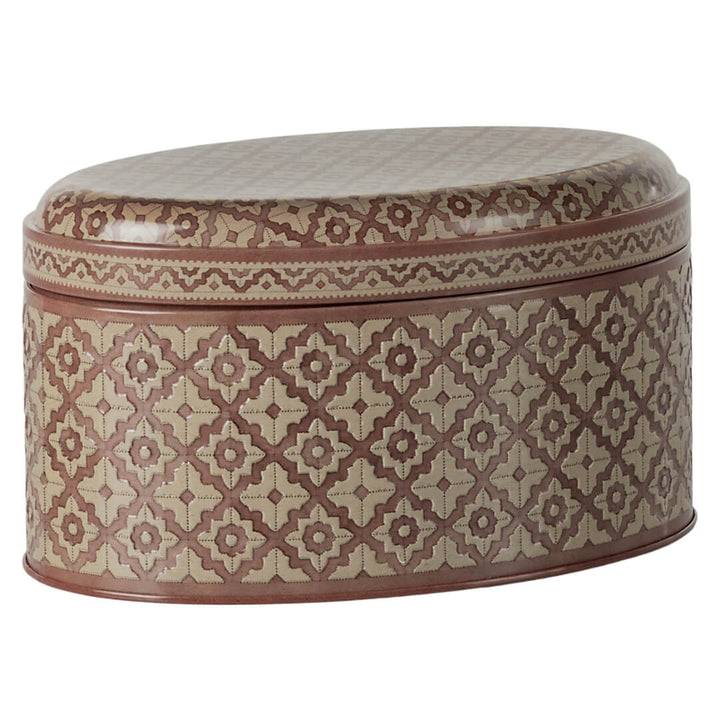 Oval shaped metal storage tin from Maileg with a geometric pattern.