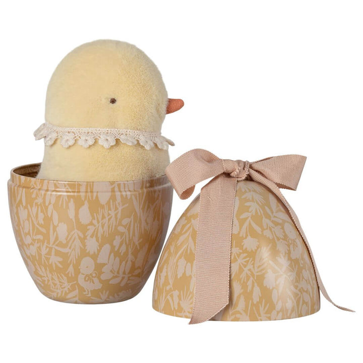 Yellow chick stuffed animal in a metal easter egg tin from Maileg.