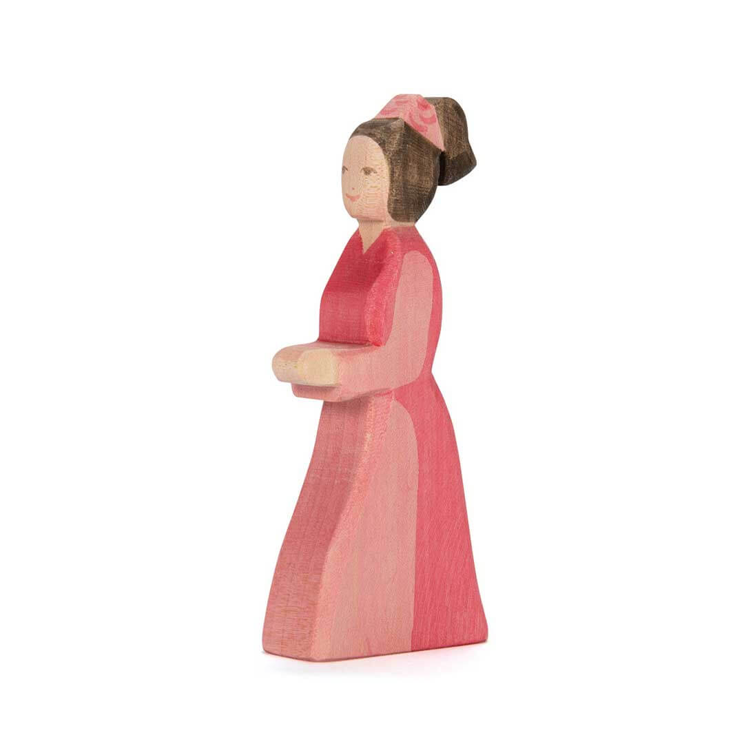 Ostheimer Wooden Figure Lady in Waiting with 2 tone pink dress, brown hair in ponytail, and pink scarf