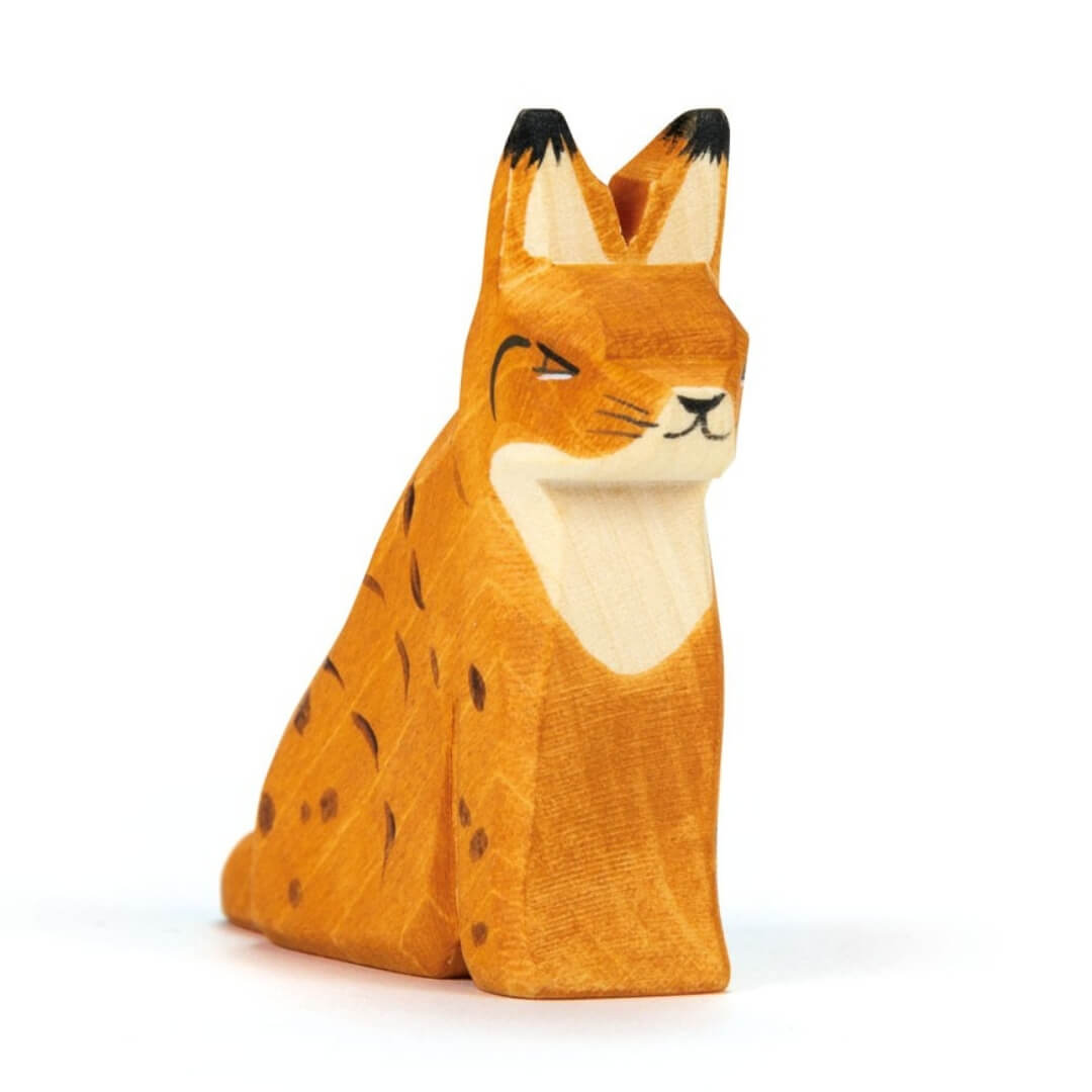 Ostheimer wooden lynx sitting figure.