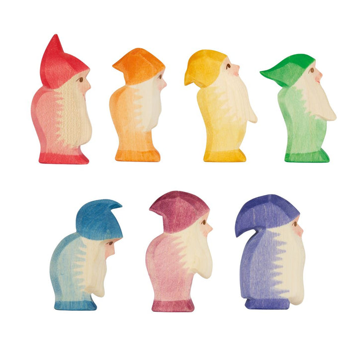 Seven wooden Ostheimer rainbow dwarves figures