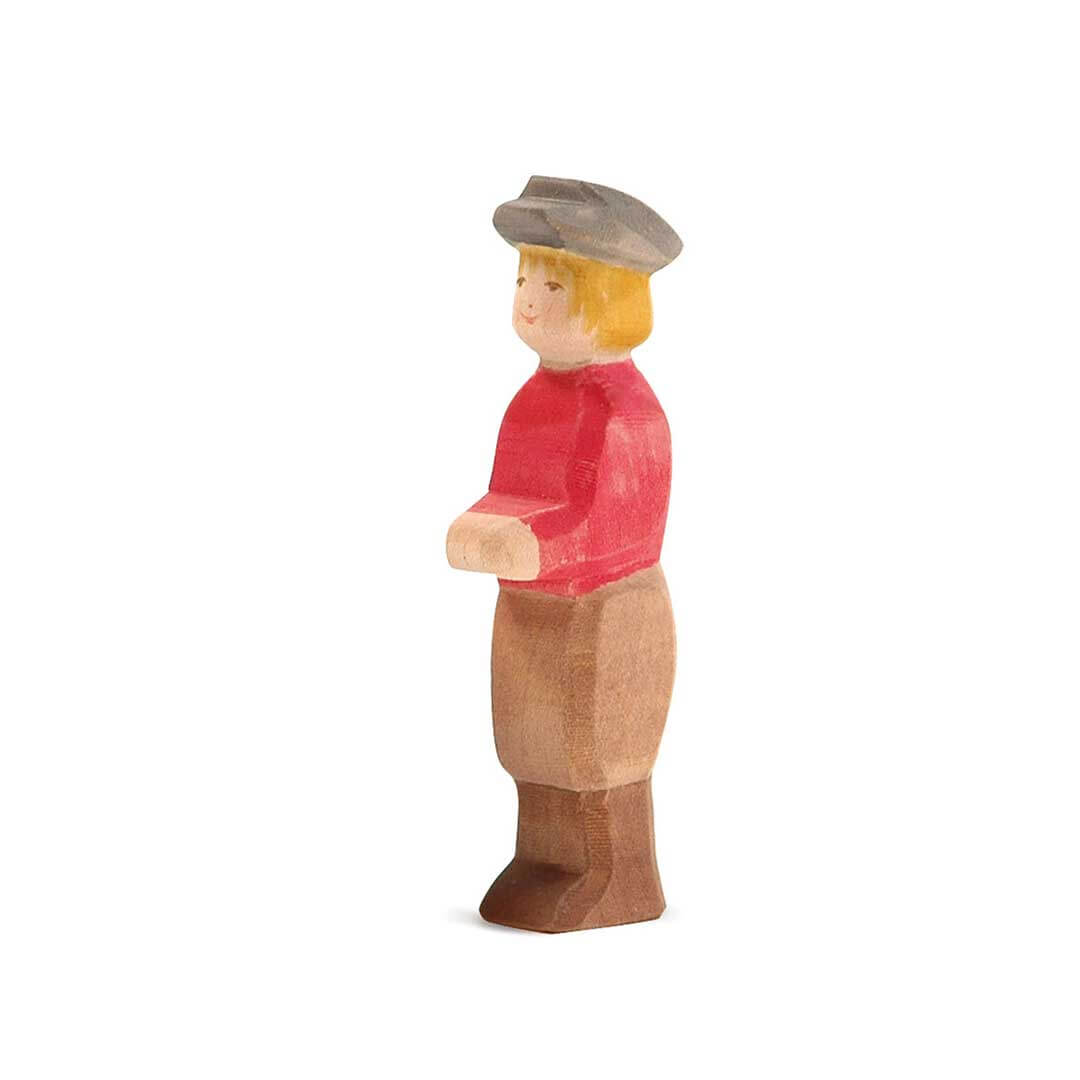 Ostheimer Wooden Figure Son with red top, gray brimmed hat, blonde hair, brown trousers