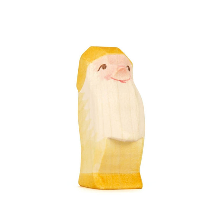 Yellow Ostheimer wooden dwarf figure.