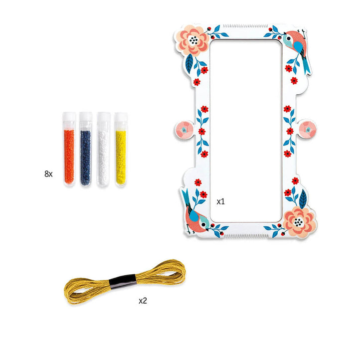 Kit includes 2 pieces of string, 1 loom, 8 vials of tiny beads